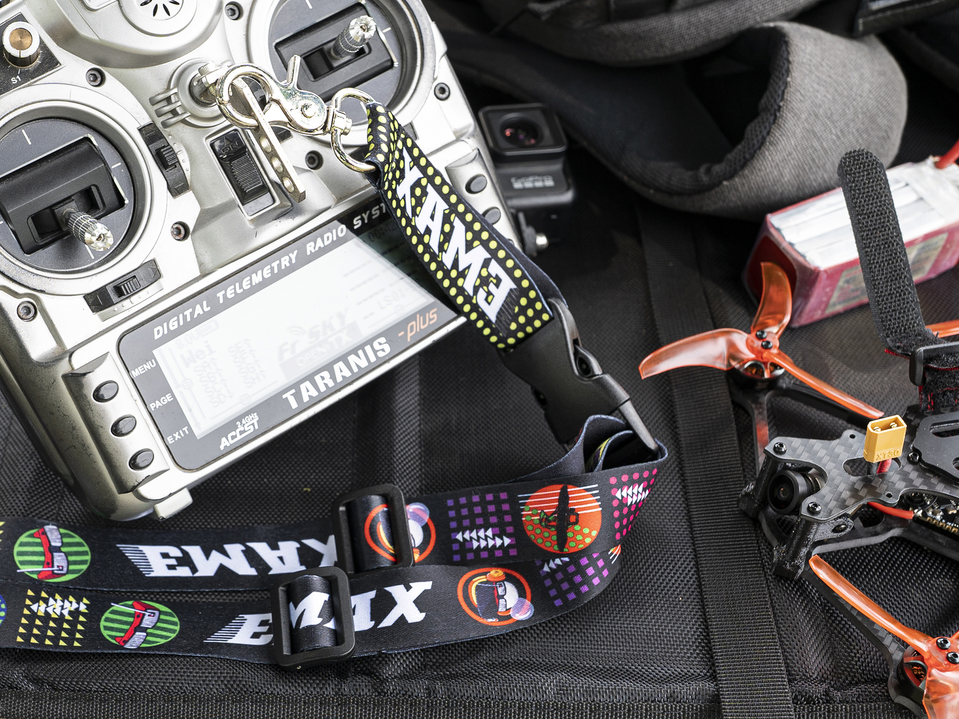 Emax Adjustable Carrying Remot - مراجعة Drone Battery Strap وسعره